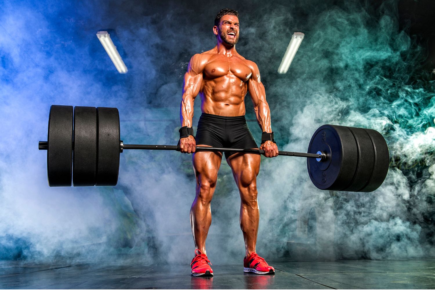 a man doing deadlift with heavy weights